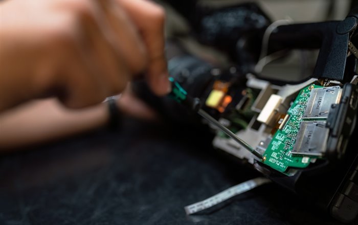 Technician working on equipment